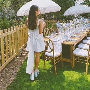 White dress with bow in back